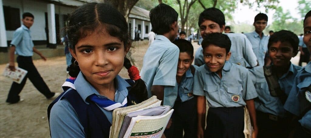Indian student with book engaged in learning